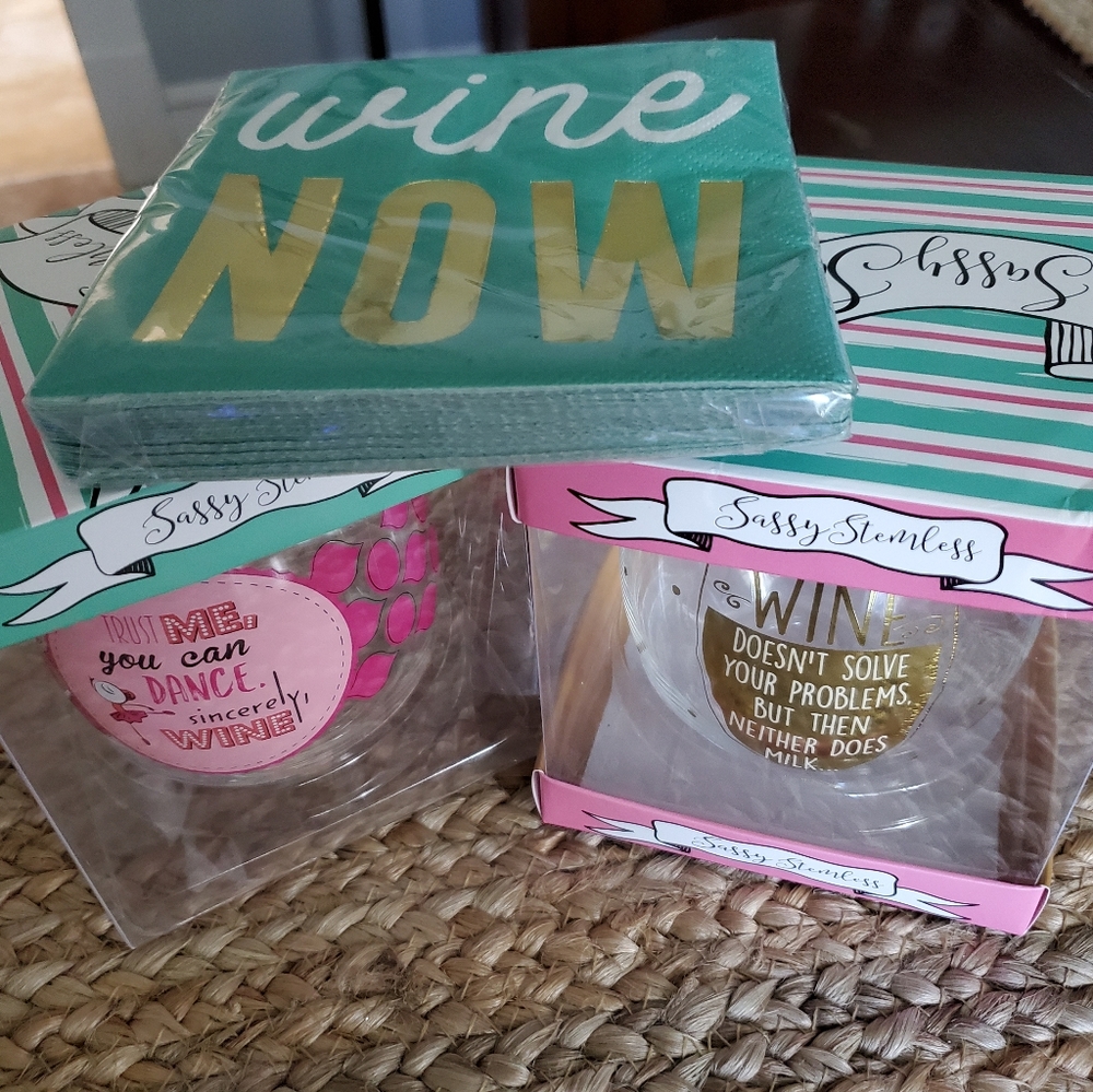 2 New wine glasses with napkins bundled together